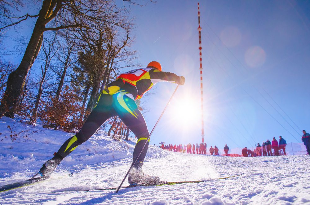 A skier in the final stretch of his run.