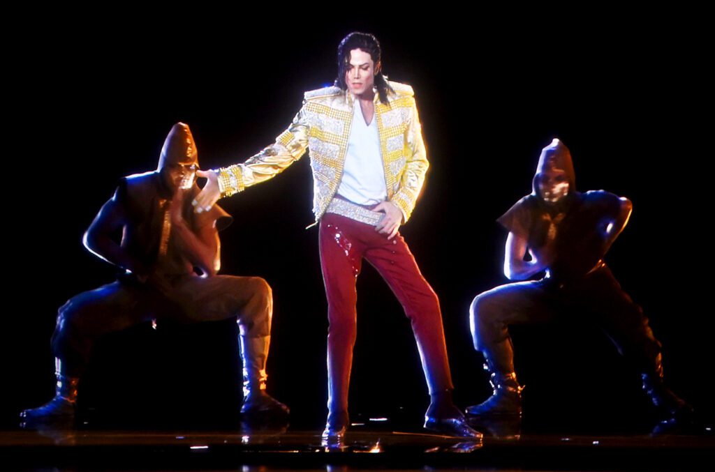 Michael Jackson performs in hologram form.