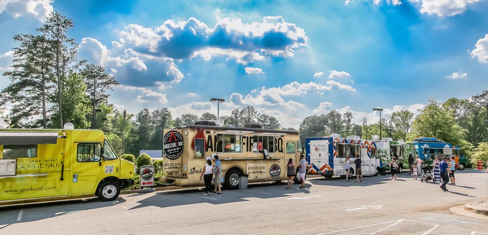 A group of food trucks outside