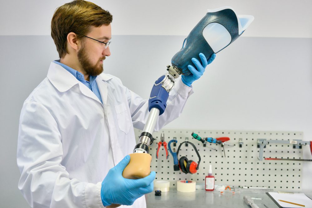 Scientist building a prosthetic