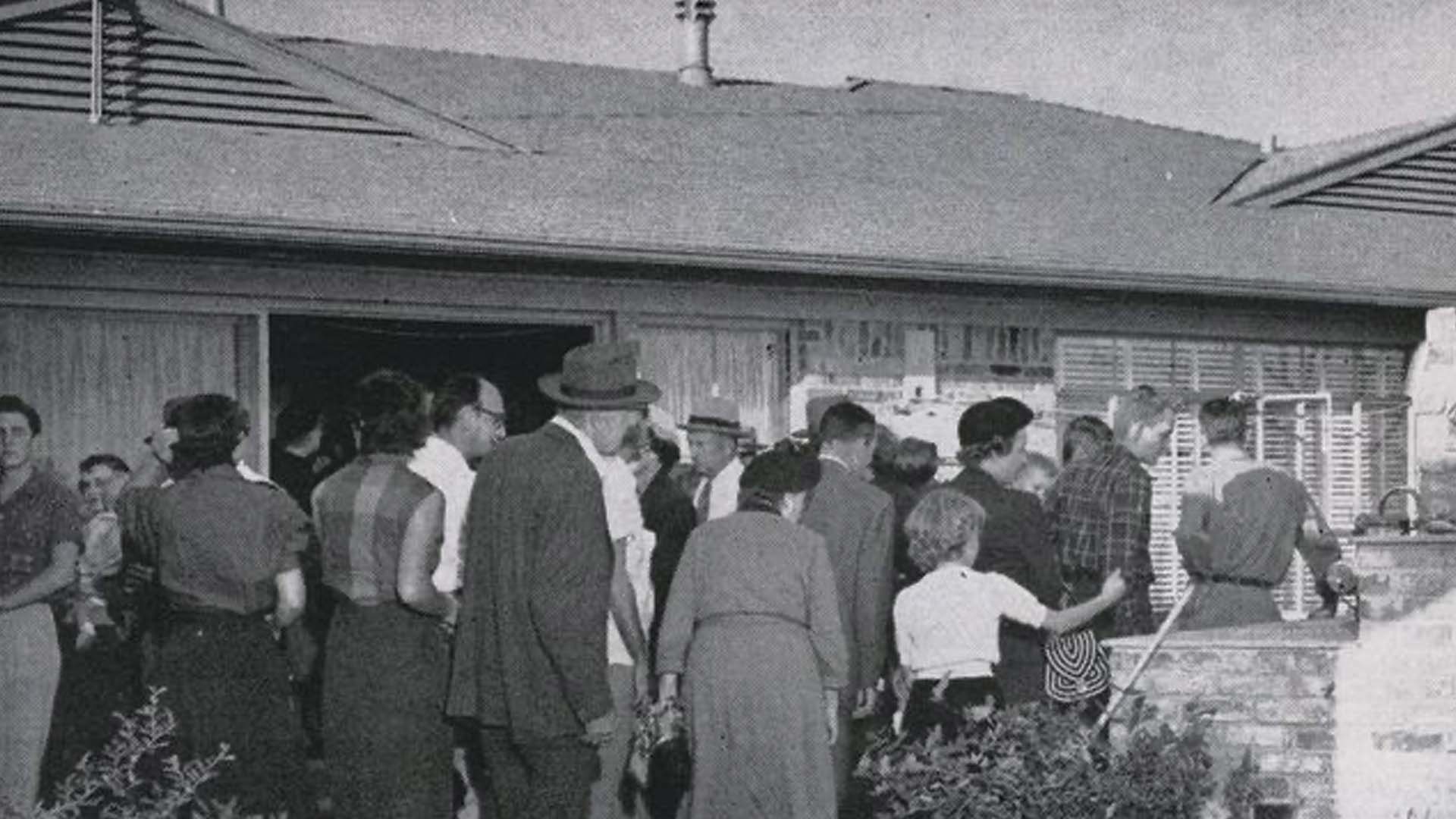 Visitors on the patio of Howdy Howard’s Holiday Home in Dallas, TX, during an open house in late 1952. Originally published in the National Real Estate and Building Journal, March 1953. (NAR Archive)