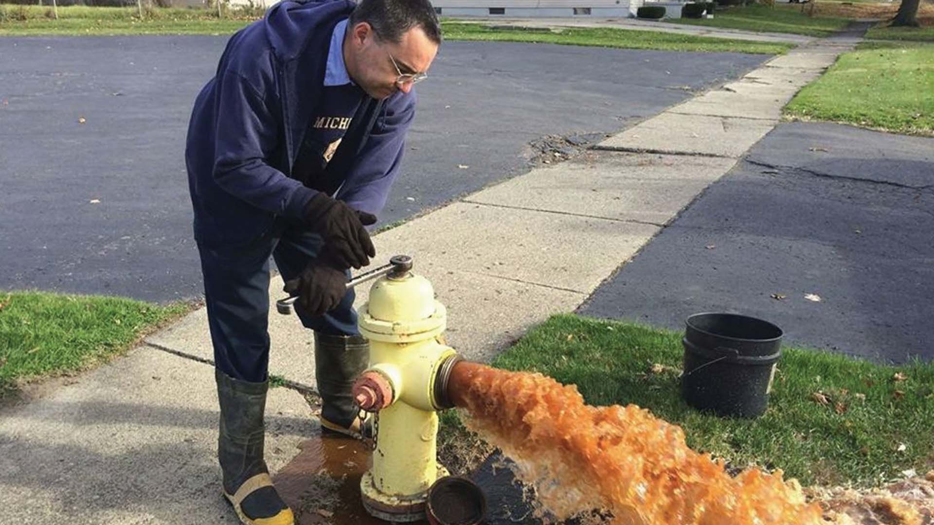 Toxic water from a hydrant in Flint, Michigan; Photo Credit: CNN