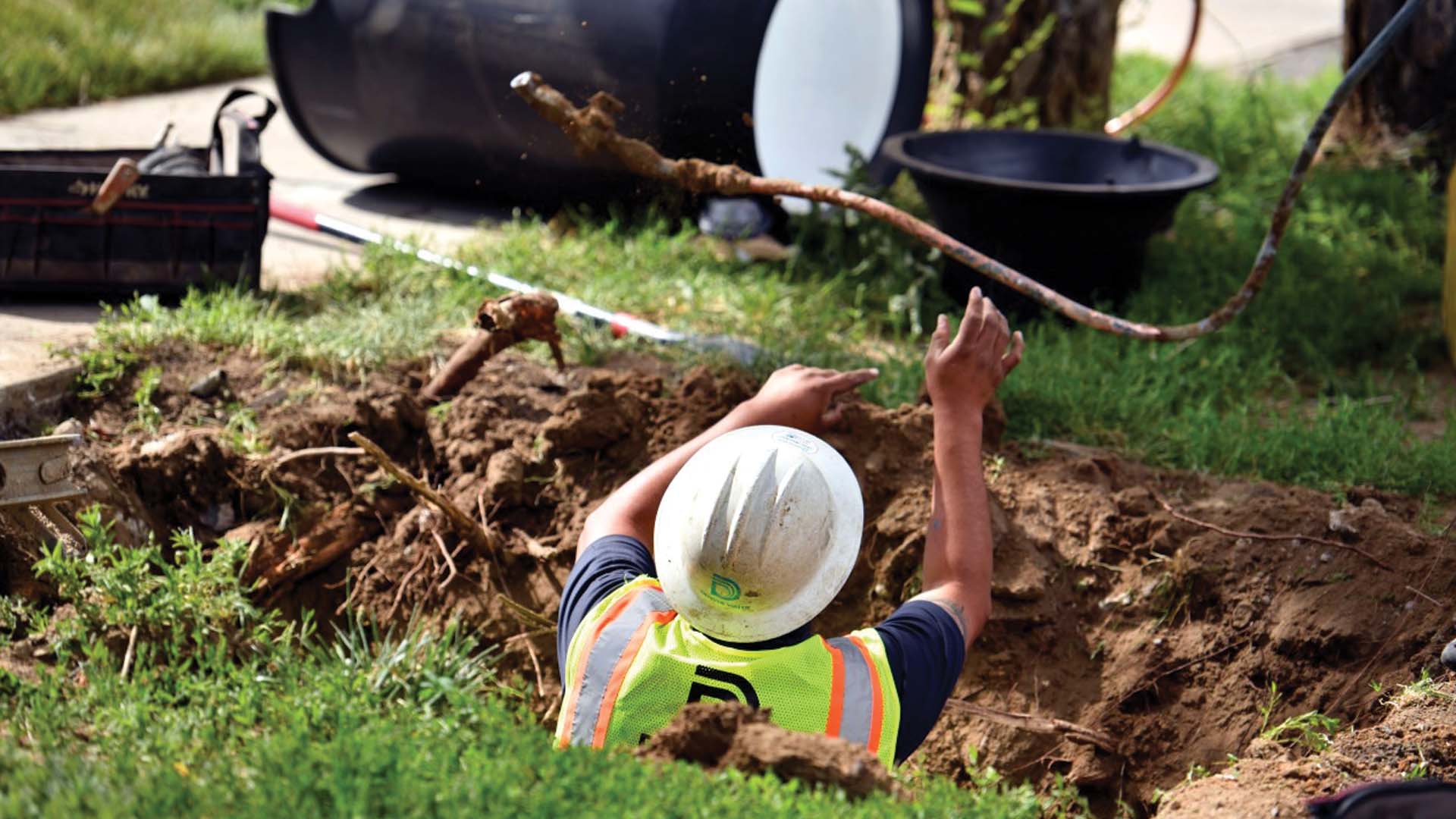 Denver Water pipeline worker replaces lead water pipeline