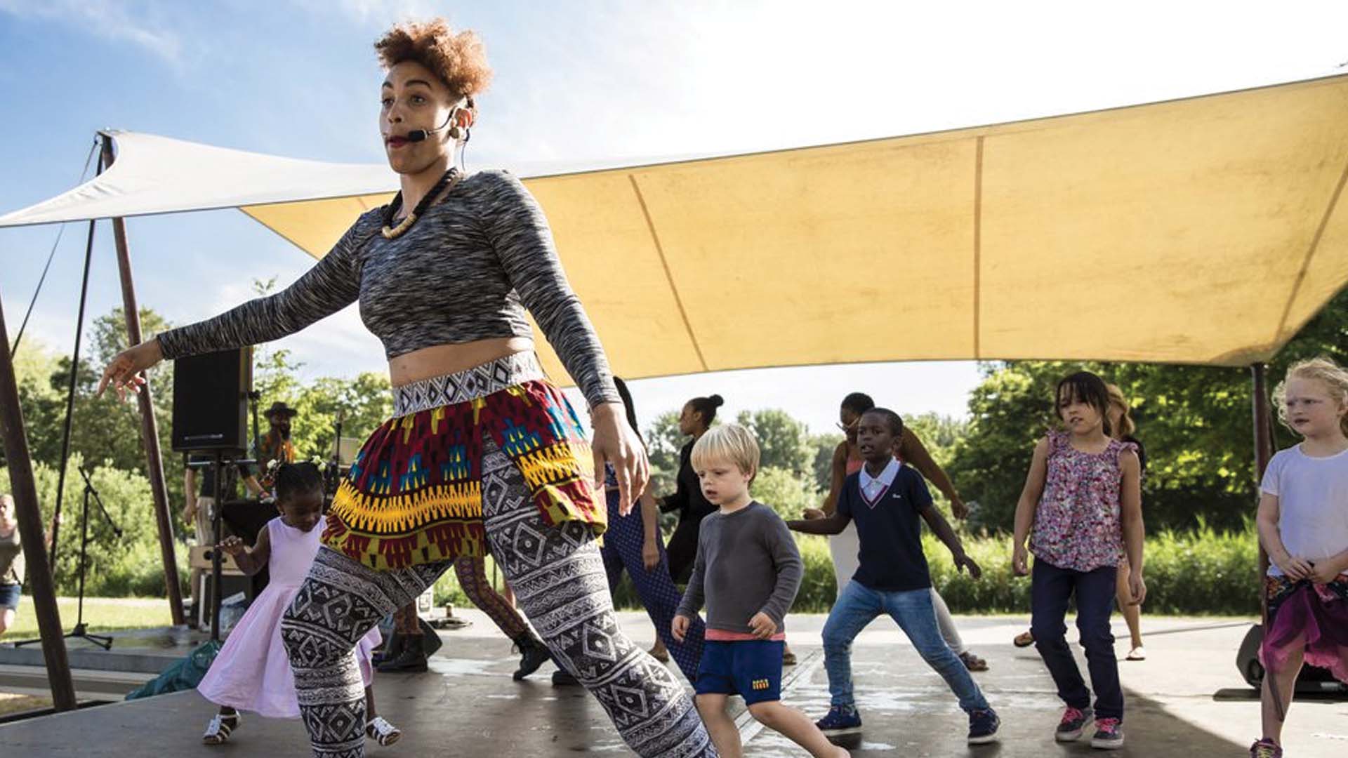 A group of children at a dance workshop.