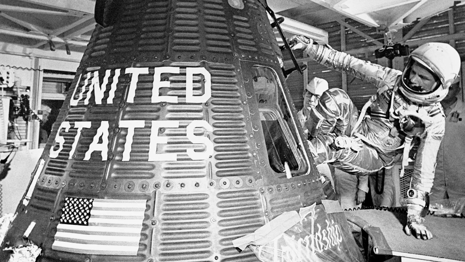 John Glenn boards the Friendship 7 capsule to become the first American to orbit the earth, during the Mercury-Atlas 6) mission, on Feb. 20, 1962