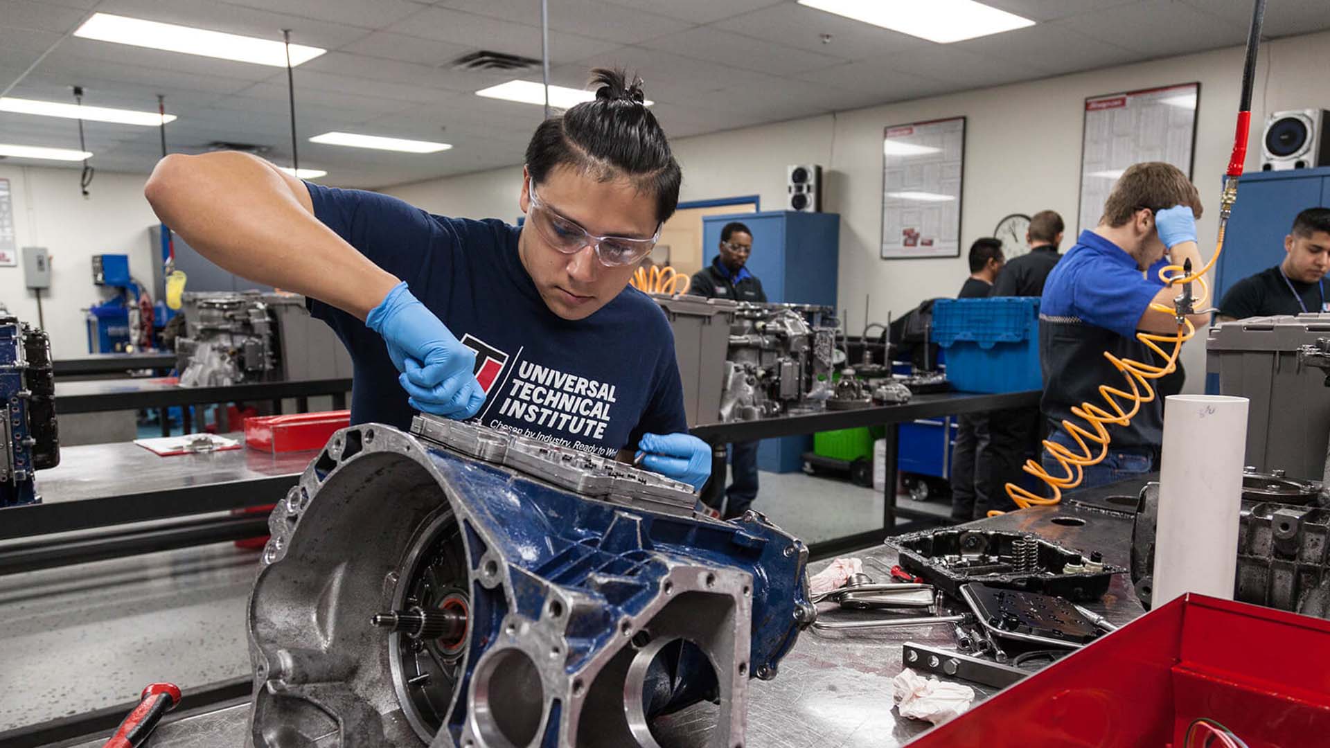 Universal Technical Institute student works on a tire. Continental Tire partnership