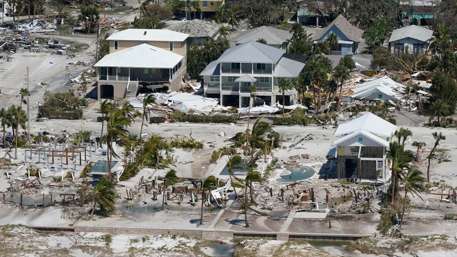 Houses damaged by Hurricane Ian in Florida along the beach