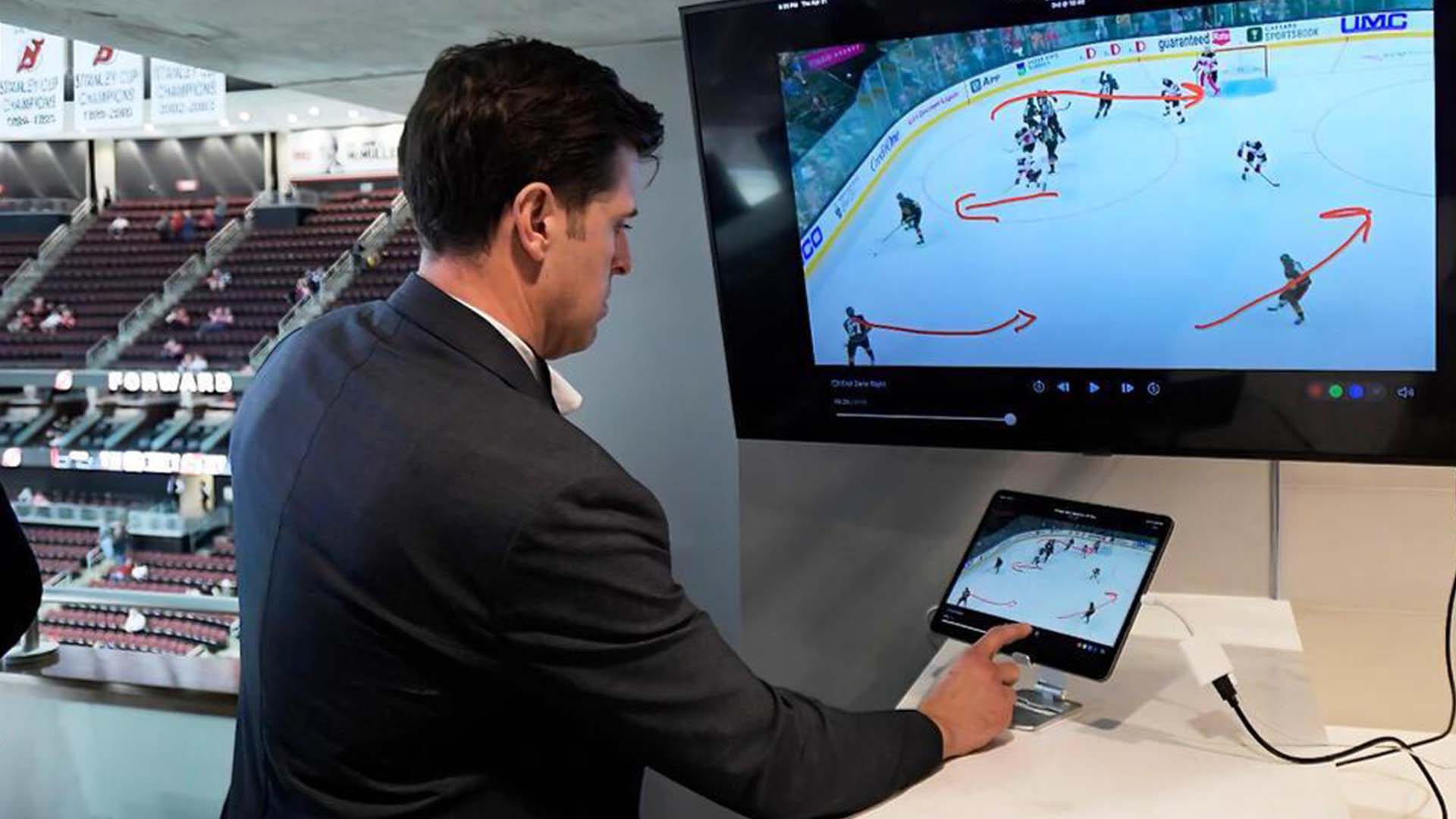 NHL Senior Director of Coaching and General Manager of Technology demonstrates the latest advances in puck and player tracking, 2022; Photo Credit: AP Photo
