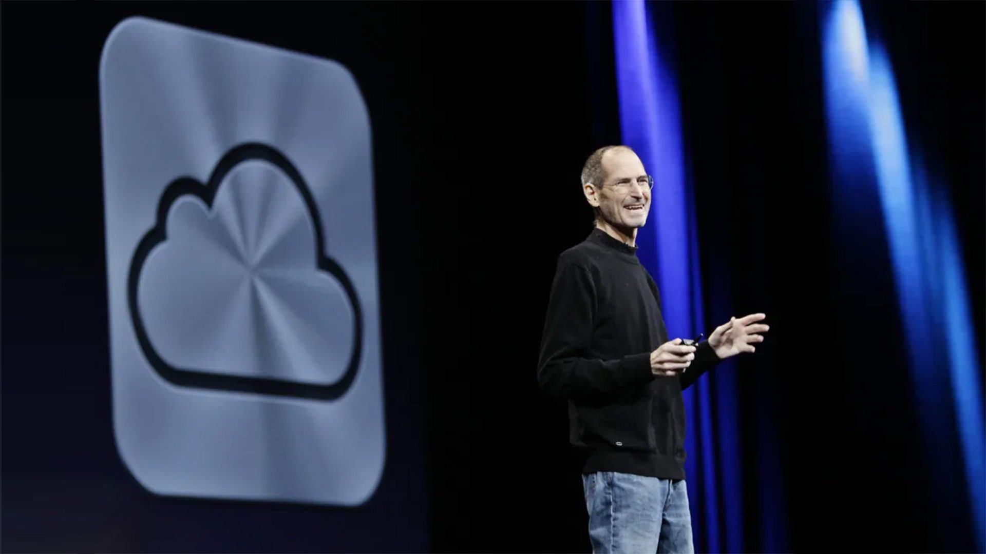 Steve Jobs on stage announcing Apple's iCloud