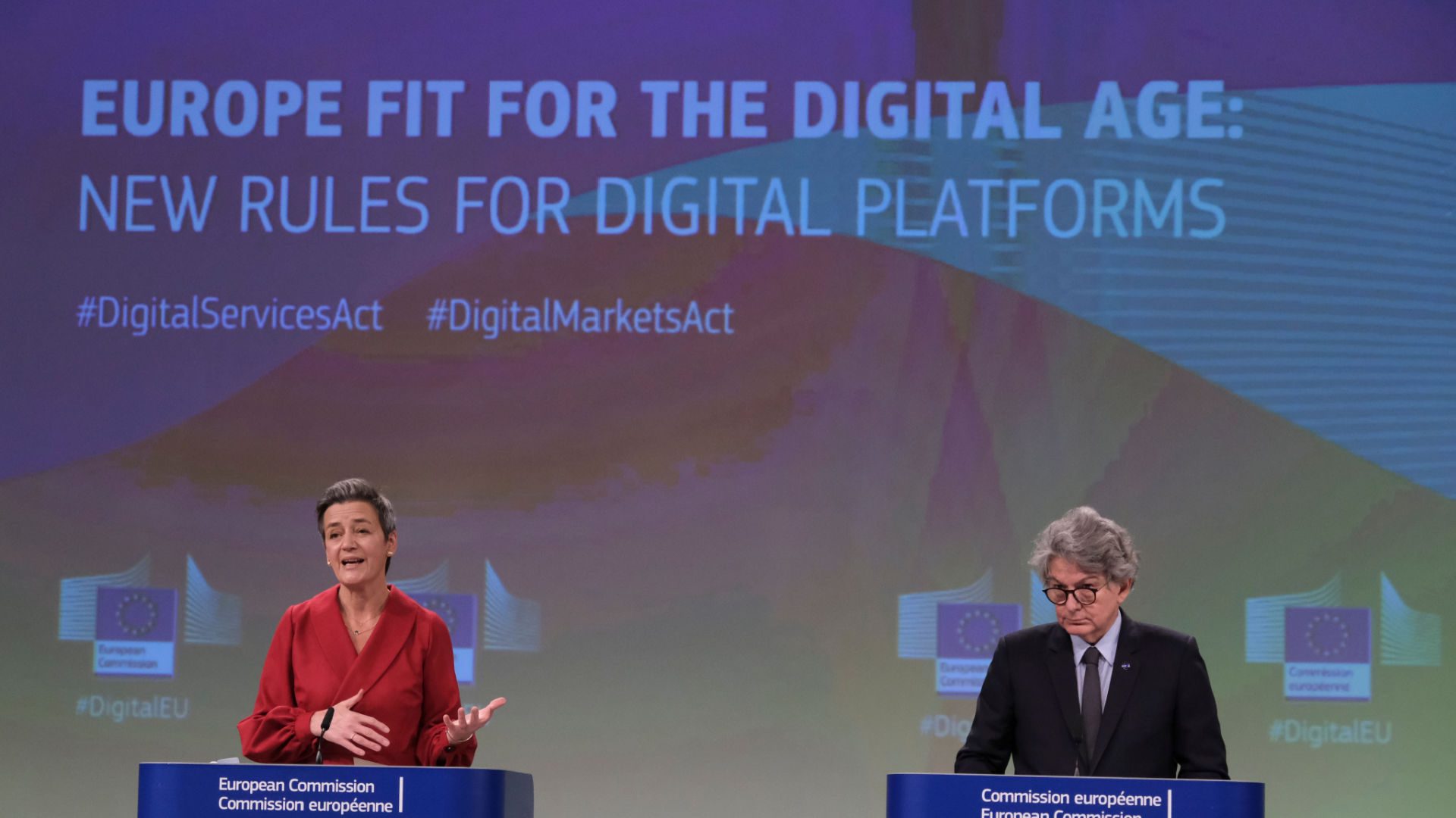 Press conference by Executive Vice-President Margrethe VESTAGER and Commissioner Thierry BRETON on stage discussing the Digital Services Act and the Digital Markets Act