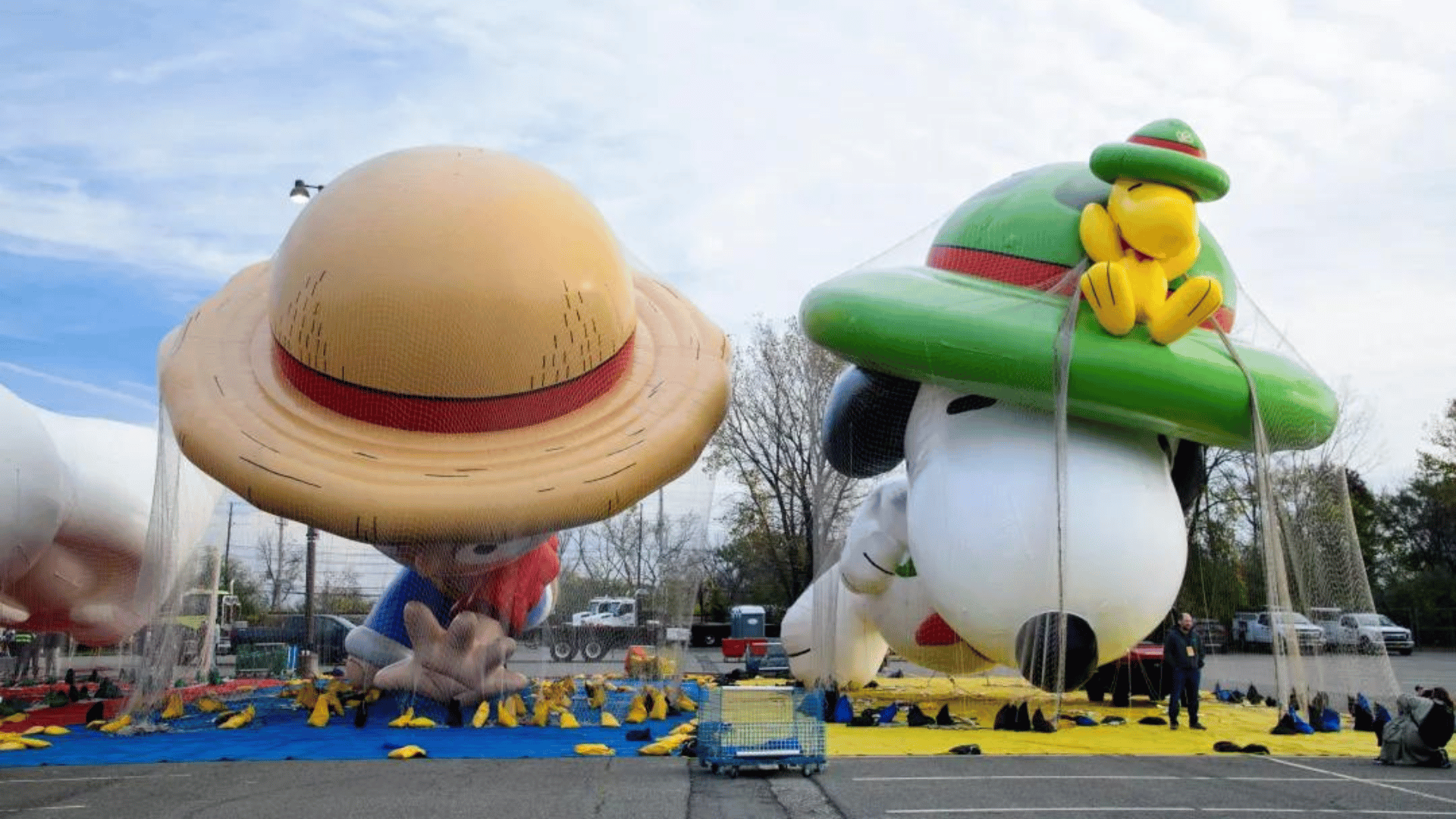Monkey D. Luffy and Beagle Scout Snoopy balloons are inflated at Macy’s Balloonfest 2023 at Meadowlands Sports Complex on Nov. 4