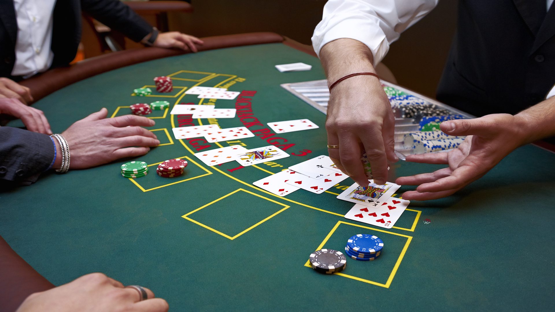 casino dealing a game of blackjack