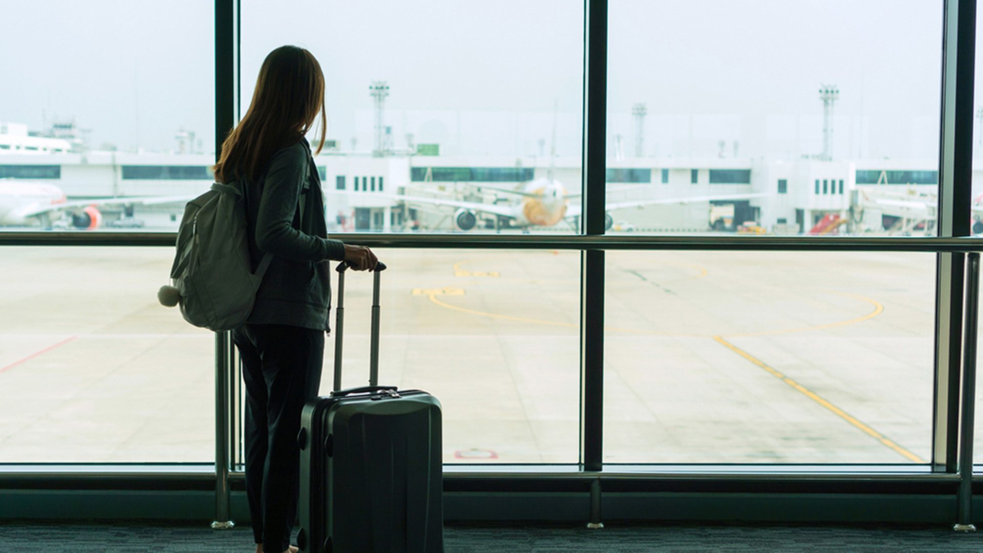 Solo Travel Tips From Experts Person Catching Flight