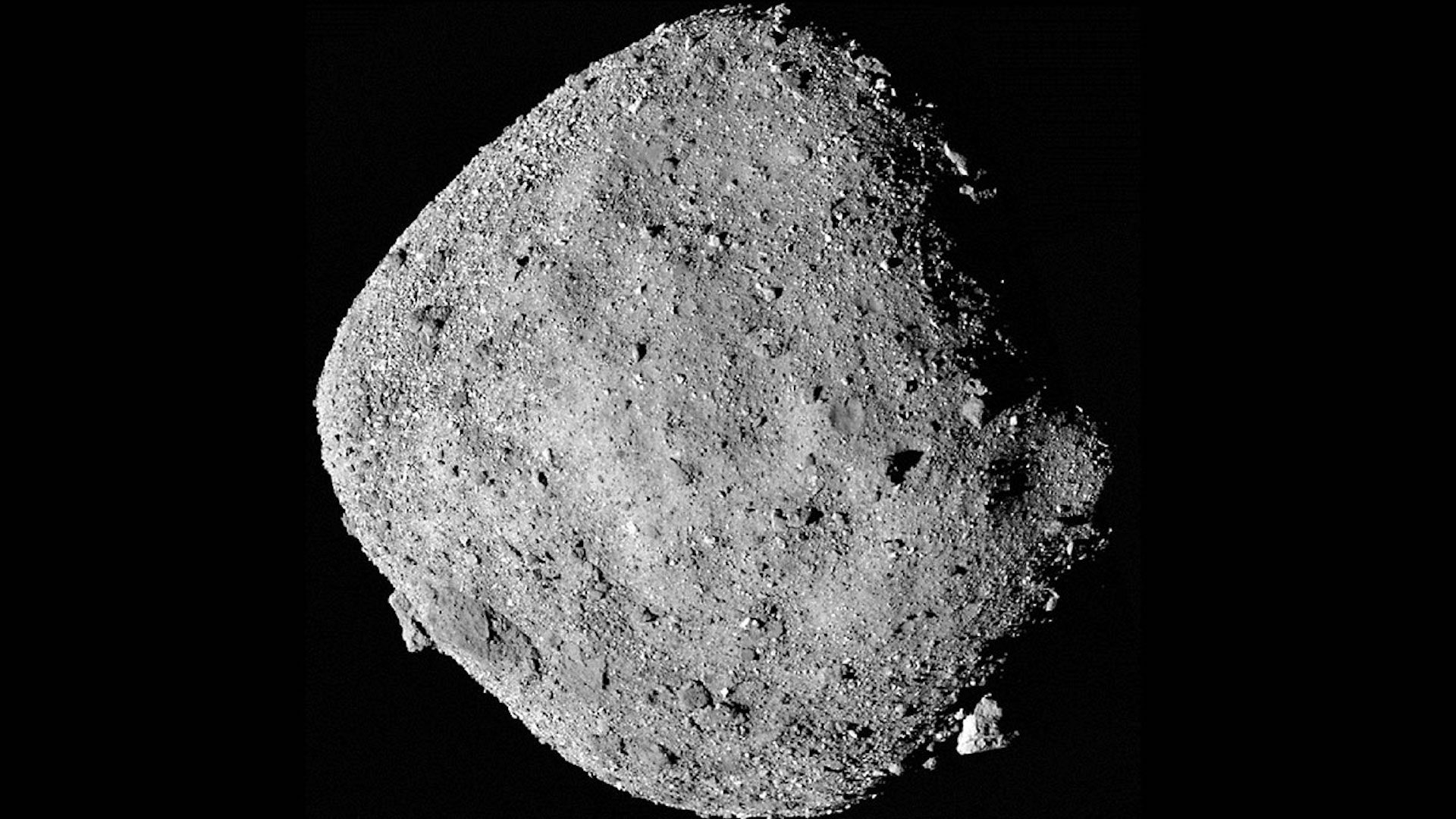 Mosaic image of asteroid Bennu is composed of 12 images collected on Dec. 2, 2018 by the OSIRIS-REx spacecraft from a range of 15 miles