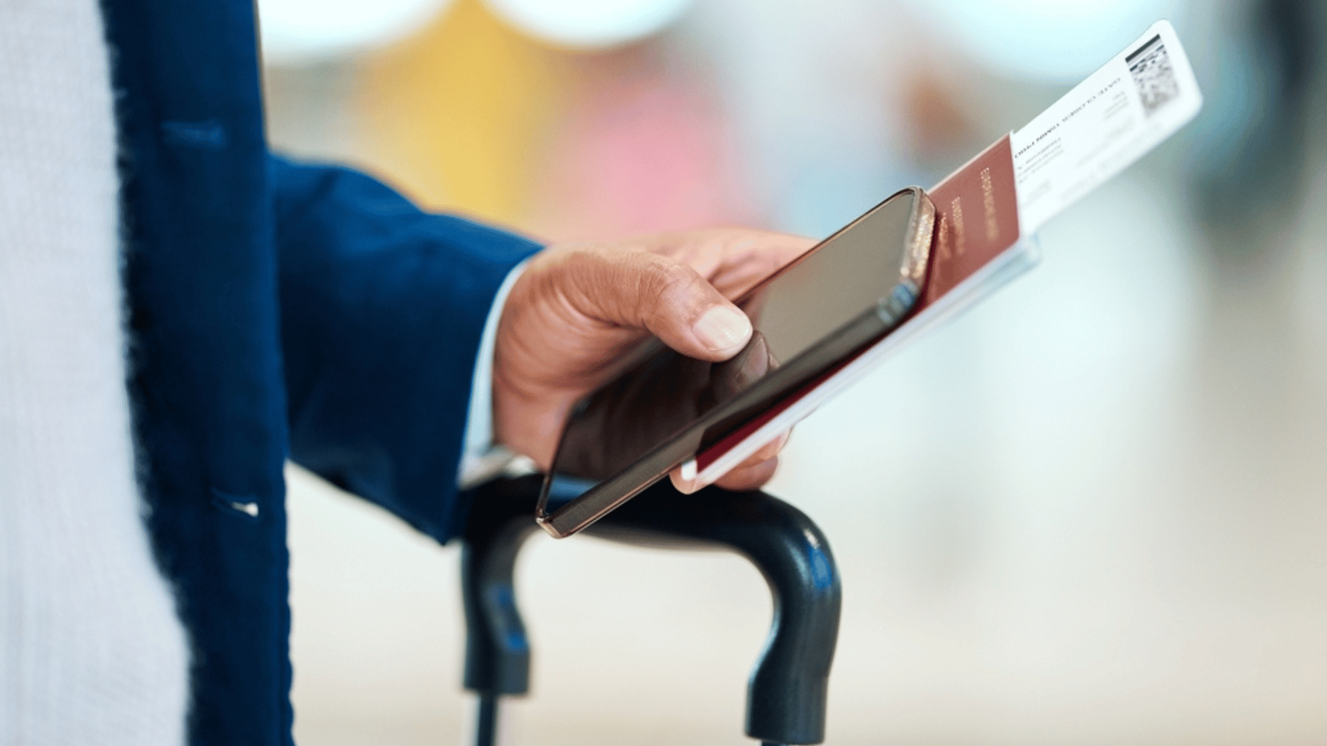 Person Walking Through Airport With Digital Passport