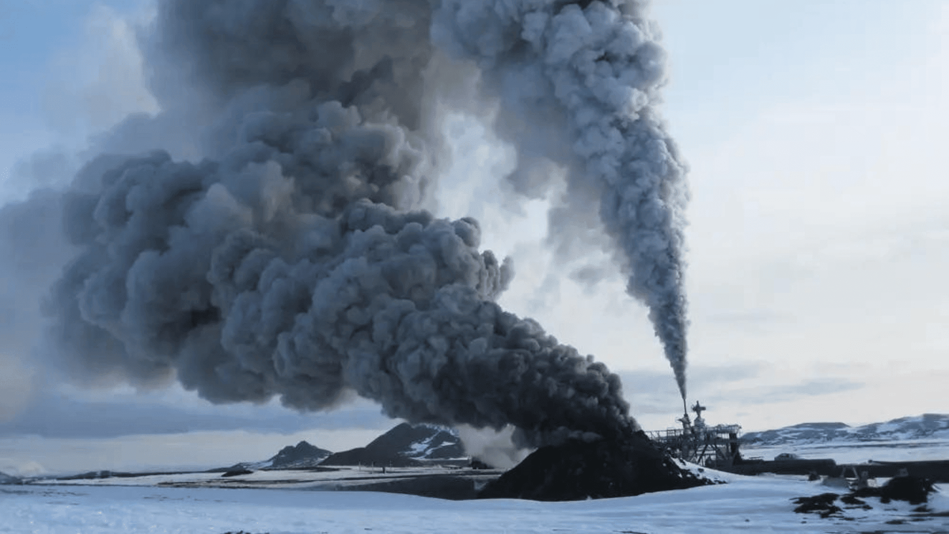 Clouds of smoke billow out of a borehole created when scientists accidentally drilled into a magma chamber in 2009. KMT