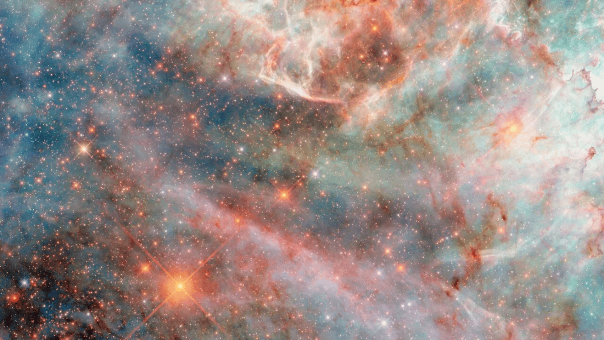 The cotton-candy clouds of gas and dust in the Large Magellanic Cloud, as seen by the Hubble Space Telescope. (Image credit: ESA:Hubble & NASA, C. Murray)