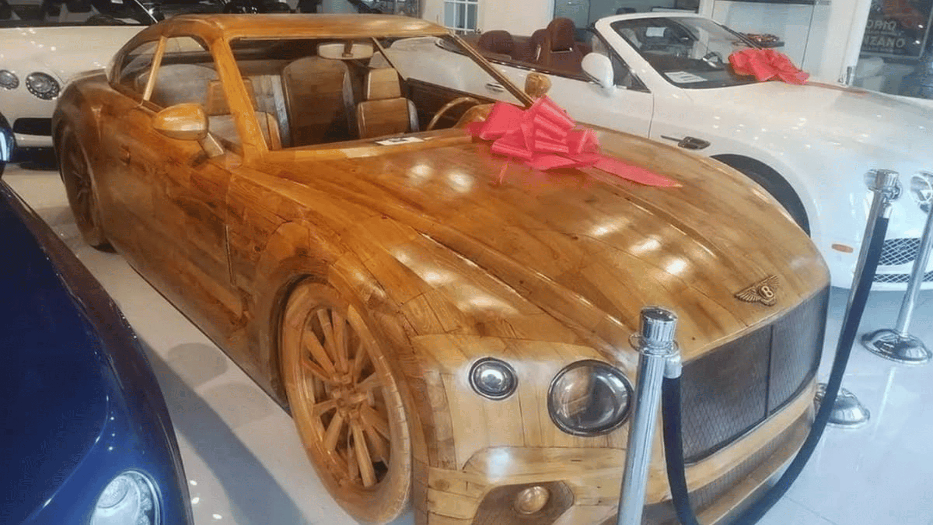 Handcrafted wooden Bentley sculpture; Photo: eBay