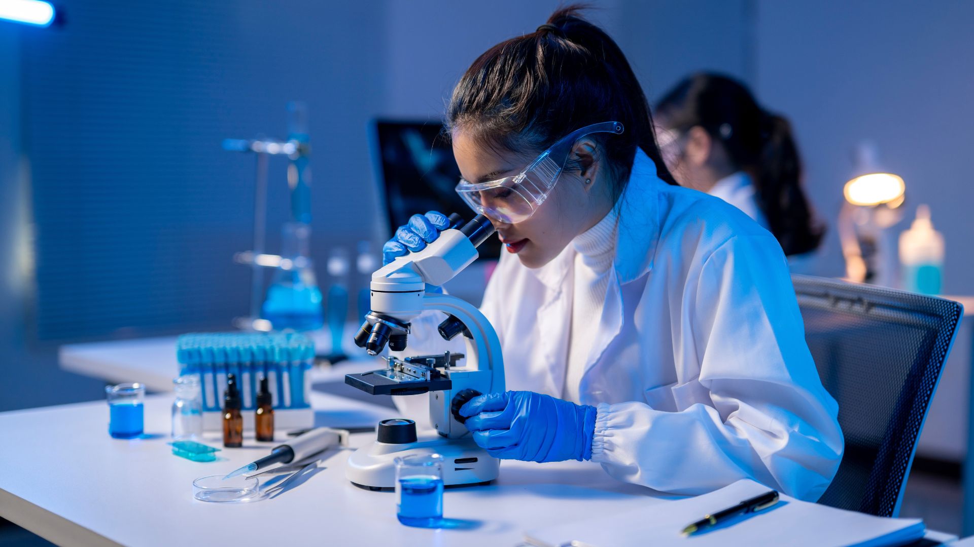 woman with microscope